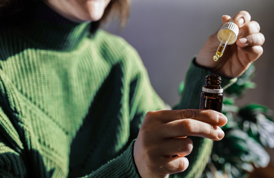 woman using sublingual medication