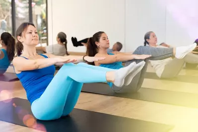 women exercising in class