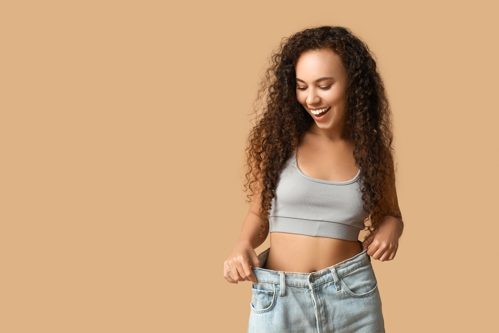 woman happy with weight loss