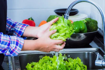 washing lettuce