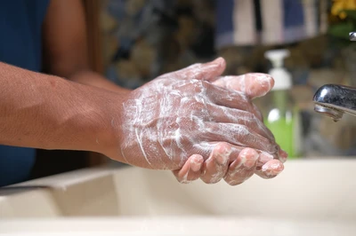 person washing hands